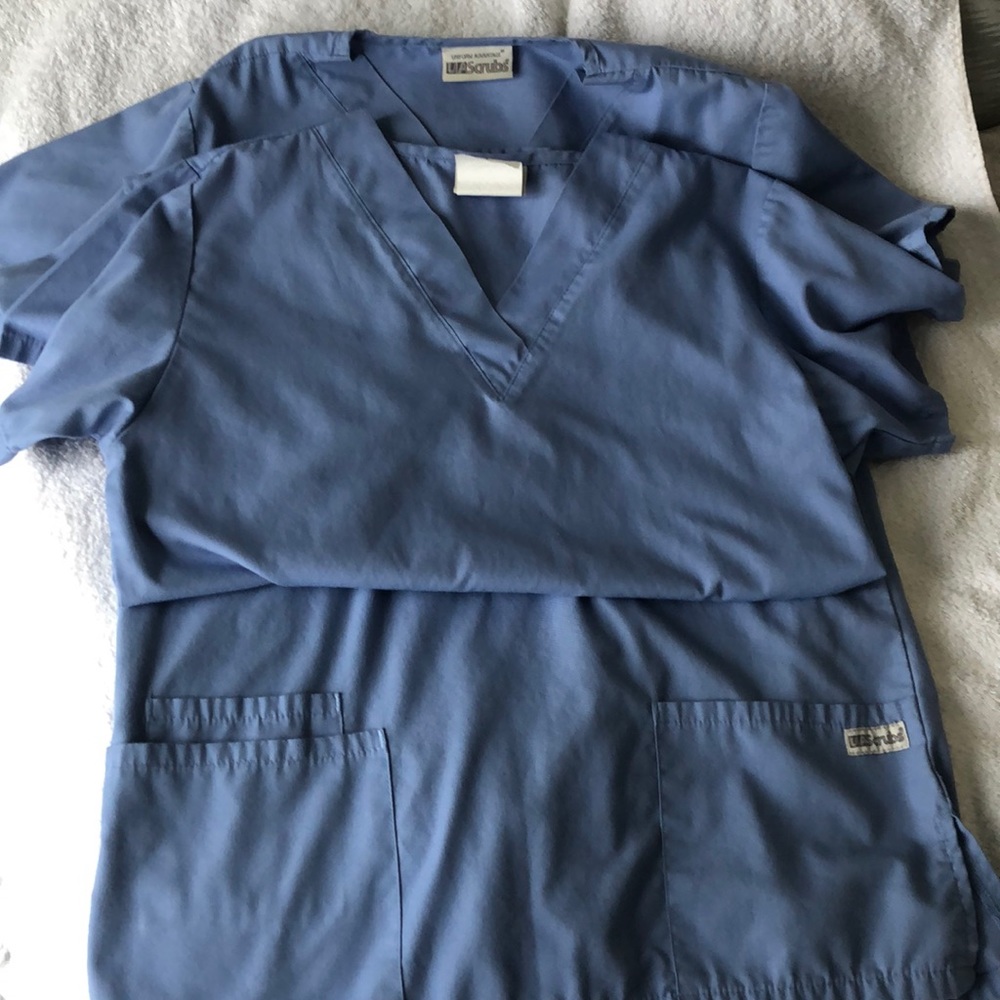 2 light blue scrub tops